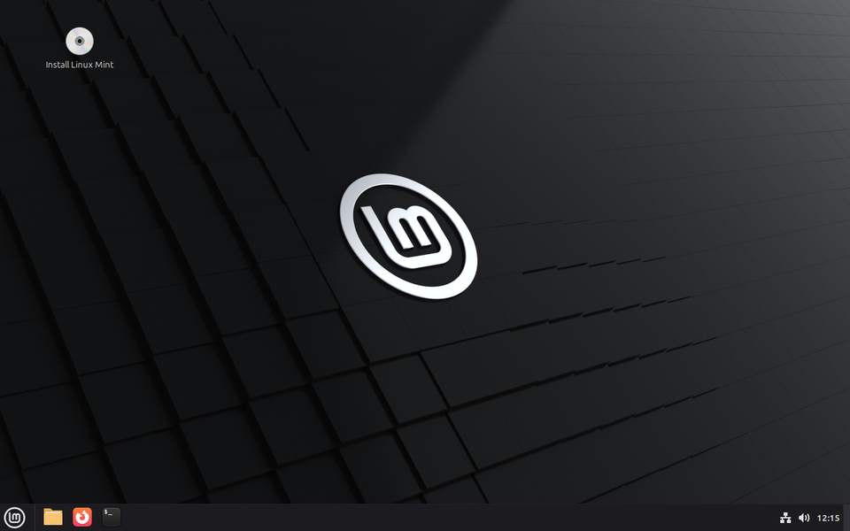 The live session runs Linux Mint from the stick. Double-click Install Linux Mint, top left, when you finish.